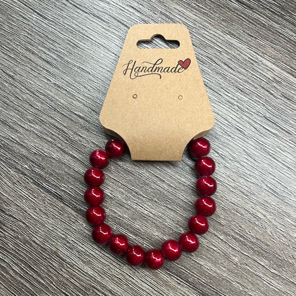 Women’s shiny red bracelet